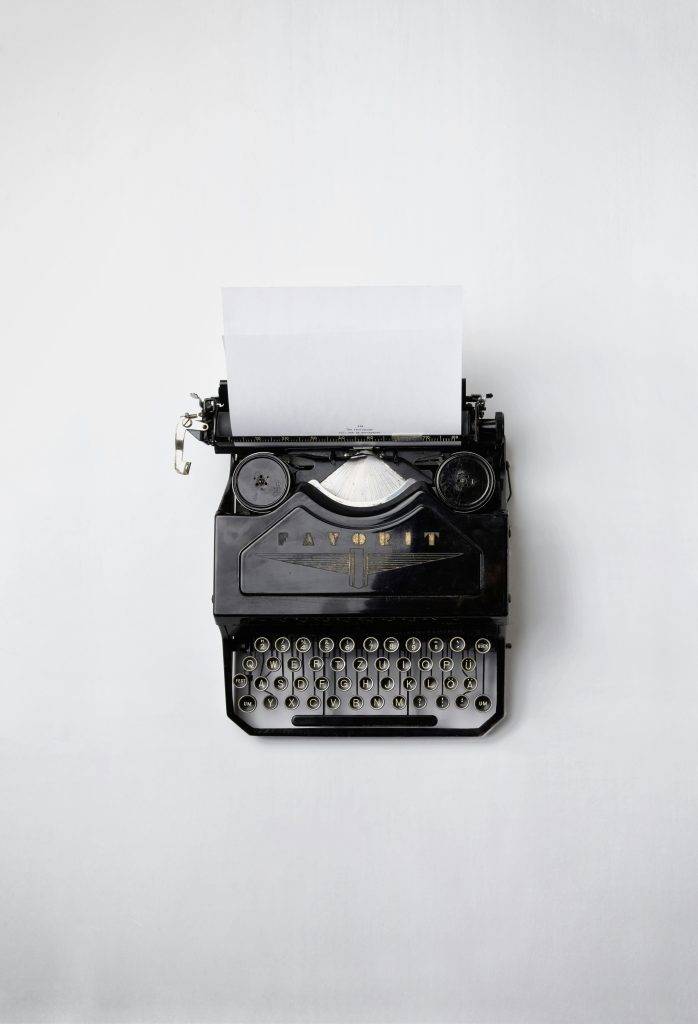 Vintage typewriter with a blank sheet — drafting a Statement of Purpose for a master’s program